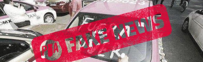 Falsa la foto de taxista escribiendo mal Uber